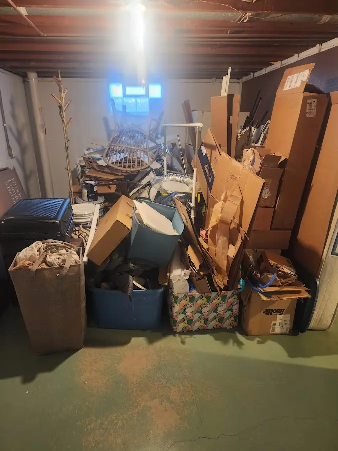 Roll-off dumpster container at job site for Construction Dumpster Rental in Waterboro